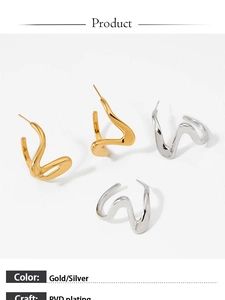Detail of gold and silver irregular wave earrings with PVD plating and modern minimalist style