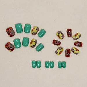 Short mint green press-on nails featuring cute vintage floral patterns and glossy finish