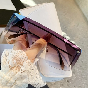 Oversized rimless sunglasses with gradient purple lenses and silver rivet studs detail