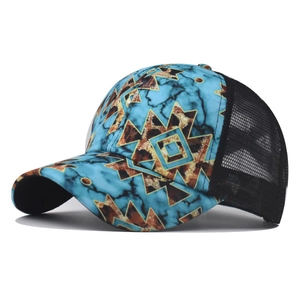 Detail view of ethnic baseball cap with horse pattern print and black mesh back breathable design
