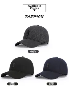 Close-up of winter men's baseball caps showing grey, black, and navy textured fabrics