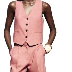 Pink V-neck waistcoat vest with button closure and matching shorts set for women