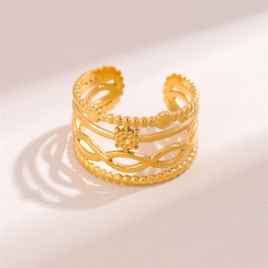 Gold-plated adjustable infinity ring with layered wave texture and star details