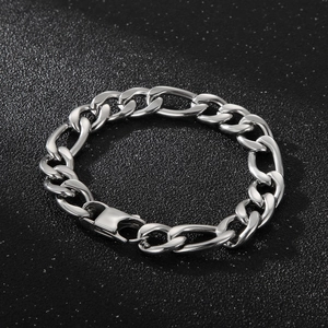 Macro shot of silver stainless steel Figaro chain links and lobster clasp with metallic luster