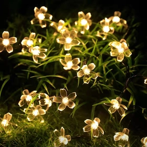 Solar outdoor cherry blossom LED string lights in warm white for garden and patio decoration