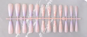 Long ballerina press-on nails featuring purple gradient, laser butterflies and rhinestones