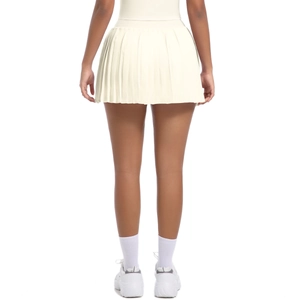 Detail view of the back pleats and high-waisted design on this cream tennis skirt