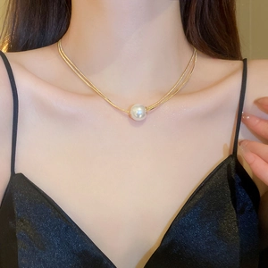 Minimalist double-layer gold plated chain necklace with a single white pearl pendant