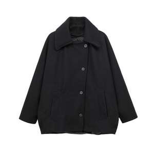 Women's black wool coat with stylish lapel and asymmetrical button closure for winter
