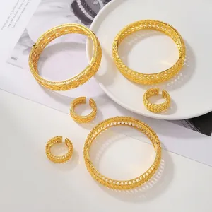 Luxury gold plated hollow cuff bracelets and adjustable rings with Dubai style patterns