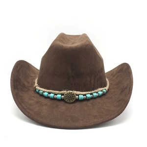 Detail of suede cowboy hat featuring woven rope band with turquoise beads and sunburst buckle