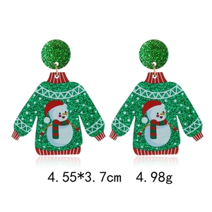 Detail view of green glitter sweater earrings with snowman motif and size measurements