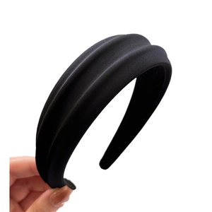 Minimalist wide black pleated headband for women featuring matte fabric design
