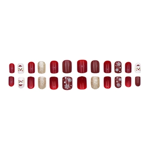 Christmas press-on nail kit with red snowflakes and Santa Claus patterns, 24 piece set