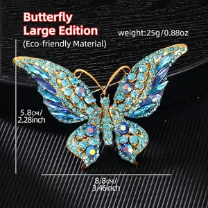 Macro shot of large butterfly brooch with blue crystals and detailed size specifications