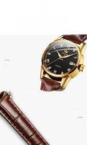 Detail of OLEVS women's quartz watch with gold case, diamond markers, and brown leather strap