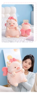 Pink plush pig toy with red bow, showing front and back views with model size reference