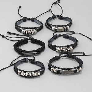 Juego de 6 pulseras de cuero trenzado negro para hombre con dijes de calavera y cruz