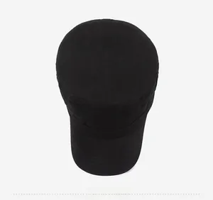 Top view of a black cotton cadet cap showing the round flat top and reinforced brim stitching