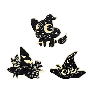 Three-piece Halloween cat and witch hat enamel pin set in black and gold alloy finish