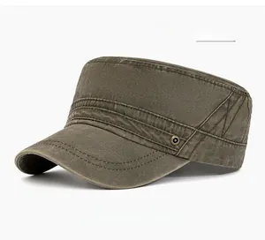 Detail of military green cadet cap with washed cotton texture and brass metal rivets