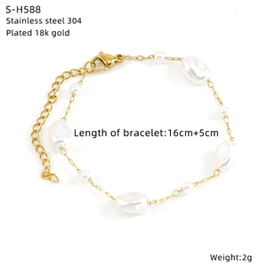 Detail of 18k gold plated stainless steel chain with pearls and colorful glass beads