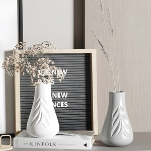 Modern white and grey matte ceramic vases with 3D embossed leaf texture for home decor