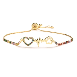 Adjustable gold bolo bracelet with multi-color cubic zirconia heart and paw print