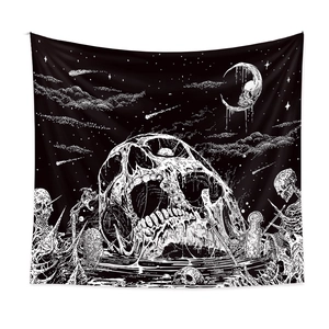 Bohemian black and white tapestry with melting skull and gothic celestial art design