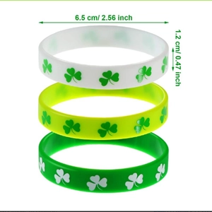 Detailed view of Saint Patrick's Day clover silicone bracelets with 6.5 cm diameter size