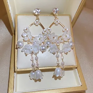 Elegant lily of the valley pearl drop earrings with sparkling rhinestones in a luxury box