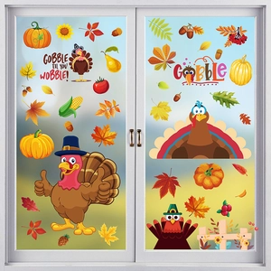 Detail of Thanksgiving window clings with turkeys and pumpkins on a glass sliding door