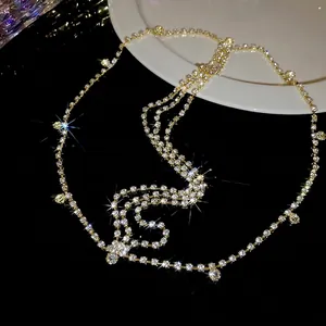 Bijou de tête doré multicouche élégant avec des strass blancs étincelants pour femmes