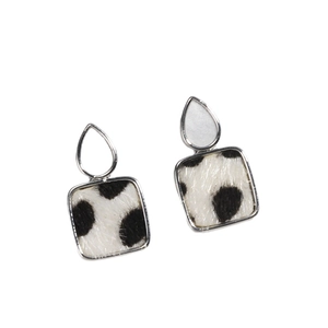 Fashionable leopard print pony hair earrings with square silver frames and pearl accents