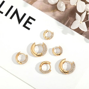 Detailed set of three gold plated hoop earrings with micro-paved cubic zirconia stones
