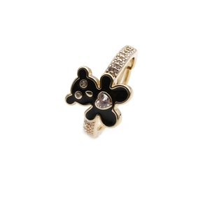 Detail of gold-plated bear ring with black enamel and heart-shaped zircon stone