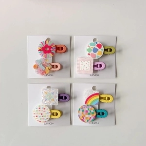 Colorful geometric acrylic hair clips set with rainbow and disco patterns for girls