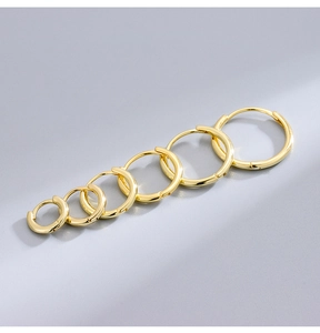 Detailed comparison of six different sizes of polished gold sterling silver hoop earrings