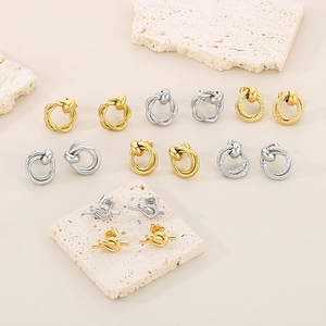 Intertwined geometric titanium steel hoop earrings in gold and silver finish set