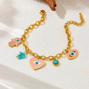 Gold chunky chain pearl bracelet with pink enamel heart and hamsa hand charms