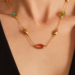 Elegant gold choker necklace featuring colorful marquise-cut glass gemstones for women