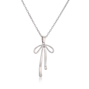 Minimalist silver bow pendant necklace with smooth finish and reflective surface