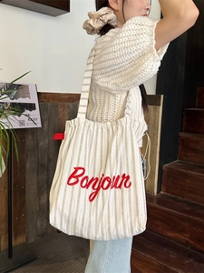 Striped canvas tote bag with red Bonjour embroidery and drawstring closure for women