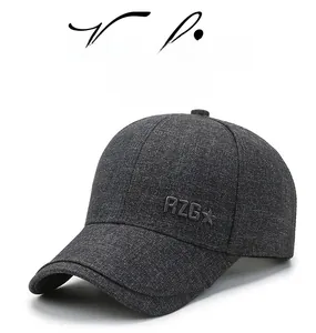 Detail of dark grey baseball cap featuring RZG star embossing and cotton texture