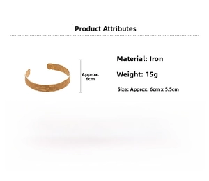 Detail view of gold crumpled texture metal cuff with 6cm diameter and 15g weight