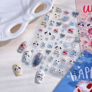 Minimalist puppy and cherry nail art stickers with blue and pink cartoon designs