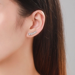 Elegant S925 sterling silver curved ear cuff featuring five graduated sparkling zircons