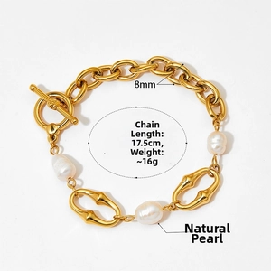 Detail view of OT buckle gold bracelet with natural pearl and 17.5cm bamboo chain