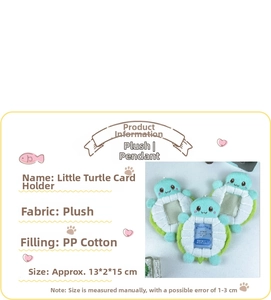 Detail view of plush green turtle card holder with transparent slot and soft fabric texture
