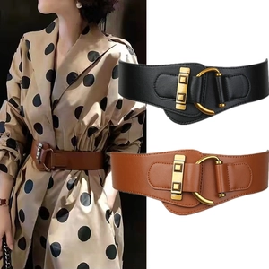 Elastic wide belt for women in black and brown colors with golden metal buckles